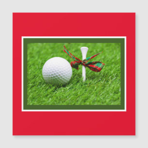 Golfbal Kerstmis met t-shirt op groen gras