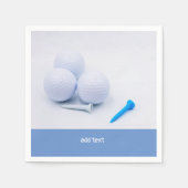 Golfbal met blauw-witte t - shirts op wit papier servet (Voorkant)