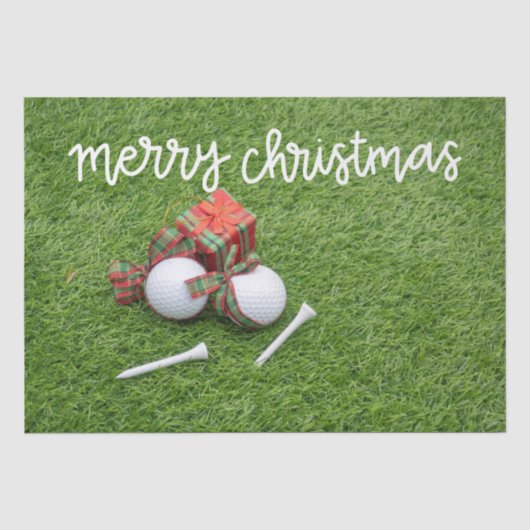 Golfbal met cadeautjes op groen kerstfeest tissuepapier (Voorkant)