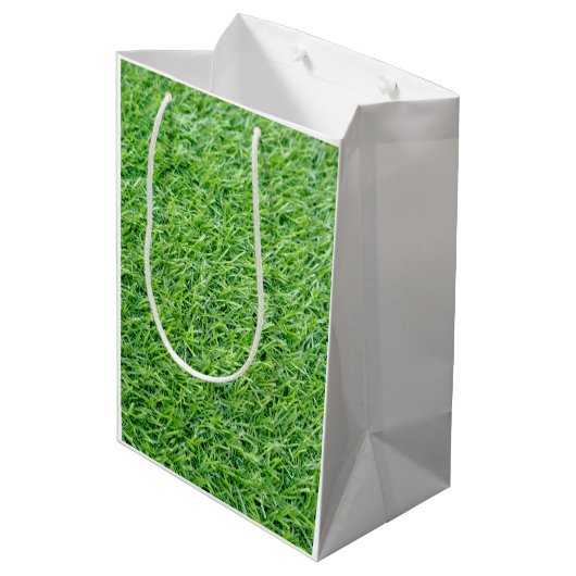 Golfbal met kerstlint voor Golfer Medium Cadeauzakje (Achterkant Gekanteld)