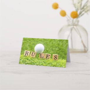 Golfbal met REGELS op groen gras Plaatskaartje