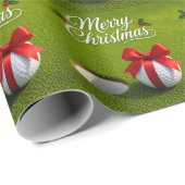 Golfbal met rode lint op groen gras cadeaupapier (Rol Hoek)