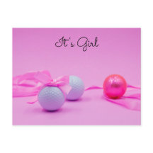 Golfbal met roze lint op roze achtergrond