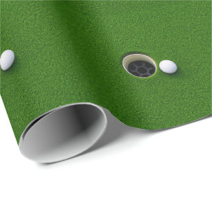 Golfbal naast hole op groene gras golfbaan cadeaupapier