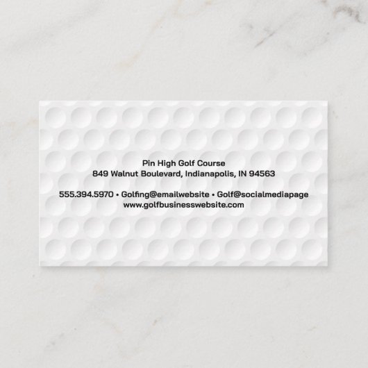 Golfbal nabij hole visitekaartje (Achterkant)