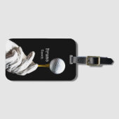 Golfbal op een speld naast een zwarte opening bagagelabel (Voorkant (horizontaal))