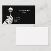 Golfbal op een speld naast een zwarte opening visitekaartje (Voorkant / Achterkant)