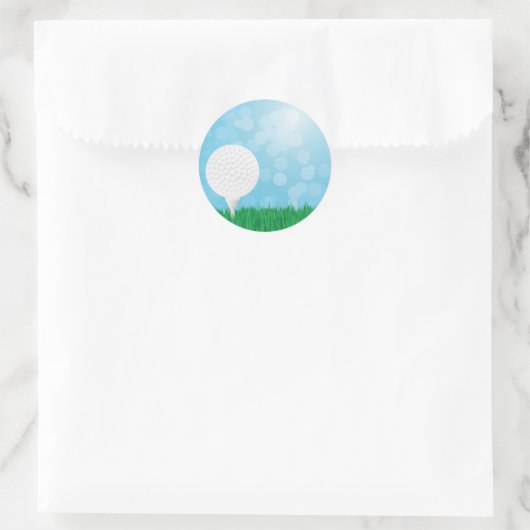 golfbal op gras ronde sticker (Tas)