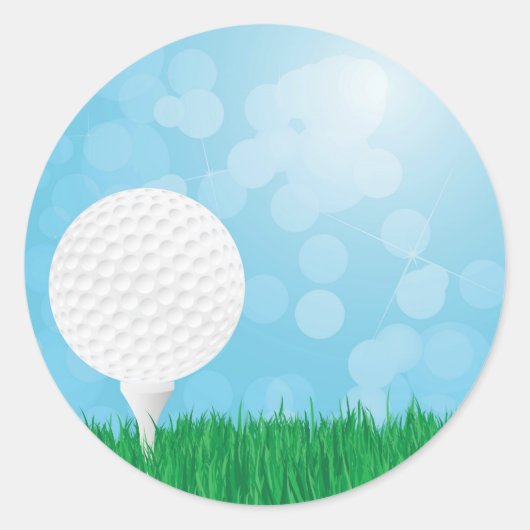 golfbal op gras ronde sticker (Voorkant)