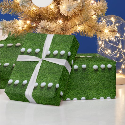 Golfbal op groen gras cadeaupapier (Feestdagen)
