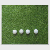 Golfbal op groen gras cadeaupapier (Vlak)