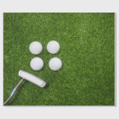 Golfbal op groen gras cadeaupapier (Vlak)