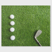 Golfbal op groen gras cadeaupapier (Vlak)