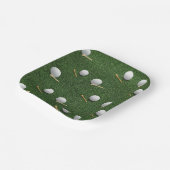 Golfbal op groen gras voor golfpartij papieren bordje (Gebogen)