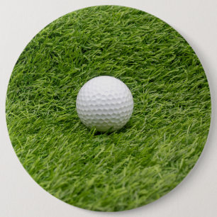 Golfbal op groene golfbal ronde button 6,0 cm