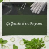 Golfbal op putting green theedoek (Gevouwen)