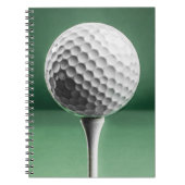 Golfbal op T-shirt Notitieboek (Voorkant)