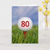 Golfbal voor 80ste verjaardag op rode tee kaart (Gele Bloem)