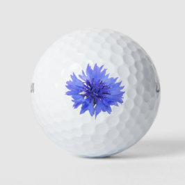 Golfballen met blauwe korenbloem