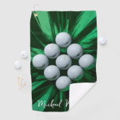 Golfballen op abstracte groene achtergrond golfhanddoek (Insitu)