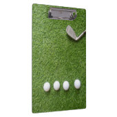 Golfballen op een groene graslaptop klembord (Rechts)