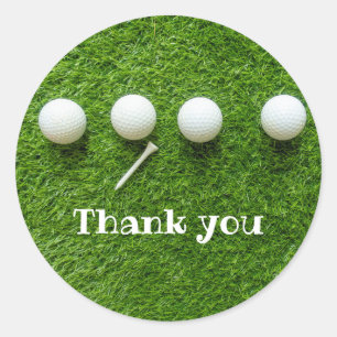 Golfballen op groen gras, bedankt ronde sticker