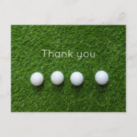 Golfballen zijn op groen gras Bedankt kaart