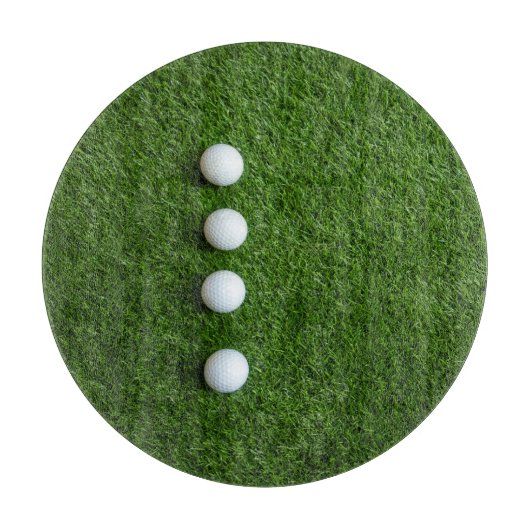 Golfballen zijn op groen gras snijplank (Voorkant)