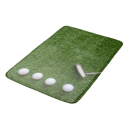 Golfballen zijn op groen grasbadmat badmat (Gekanteld)