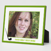 Golfclub en zwarte bal, groene gewoonte fotoplaat (Zijkant)