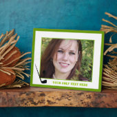 Golfclub en zwarte bal, groene gewoonte fotoplaat (Zijkant)