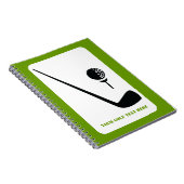 Golfclub en zwarte bal, groene gewoonte notitieboek (Rechterzijde)