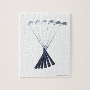 Golfclubs op witte achtergrond legpuzzel