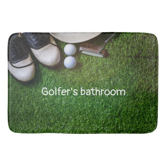 Golfertoilet met golfballen op groen gras b badmat (Voorkant)