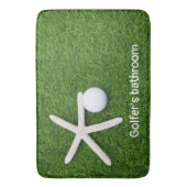 Golfertoilet met golfballen op groen gras badmat (Voorkant Verticaal)