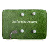 Golfertoilet met golfballen op groen gras badmat (Voorkant)