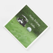 Golfkar en golfbal op groen servet (Hoek)