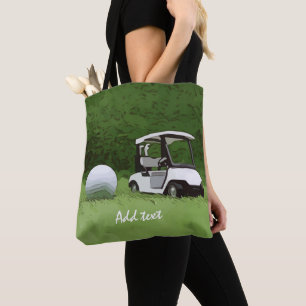 Golfkar en golfbal op groene gras Golfer Tote Bag