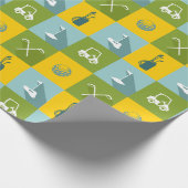 Golfpictogrammen op gouden en blauwe vierkantjes cadeaupapier (Hoek)