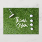 Golfputters zijn op groen gras briefkaart (Voorkant)