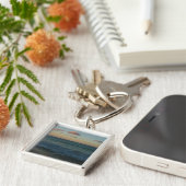 Golven kruipen in het Zonnestrand Landschap Sleutelhanger (Zijkant)