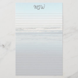 Golvend papier met monogram en lijnen