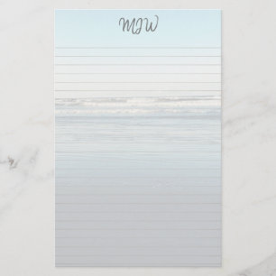 Golvend papier met monogram en lijnen