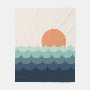 Golvende blauwe oceaan bij zonsondergang fleece deken
