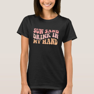 Golvende zon zand drank in mijn hand ring aan mijn t-shirt