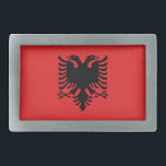 Gordelgesp met vlag van Albanië Gesp<br><div class="desc">Voeg een vleugje Albanese trots toe aan je garderobe met onze exclusieve riemgesp met de vlag van Albanië! Deze riemgesp, vervaardigd met nauwgezette aandacht voor detail, is meer dan alleen een accessoire; het is een viering van het Albanese erfgoed en culturele trots. Het ontwerp toont de iconische zwarte dubbelkoppige adelaar...</div>