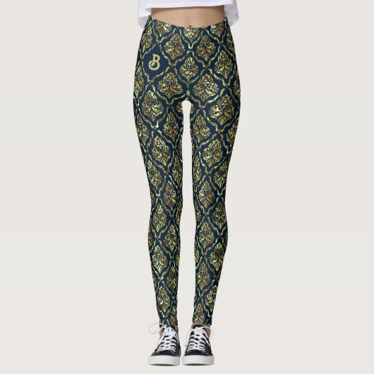 Goud  damast patroon op donkerblauw leggings (Voorkant)