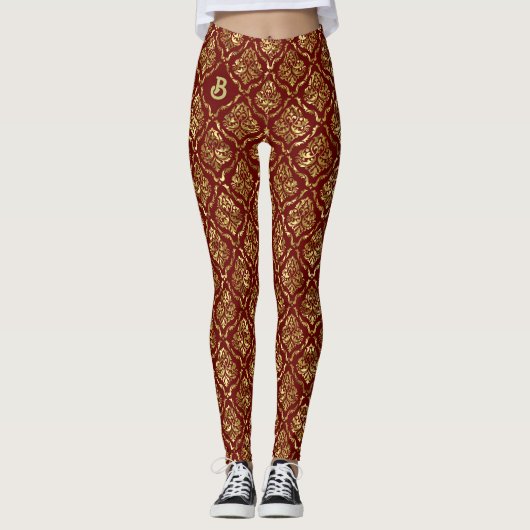 Goud damastpatroon op donkerrood leggings (Voorkant)