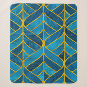 Goud en blauw patroon op grijze achtergrond, naadl sherpa deken