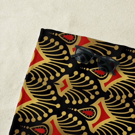 Goud en rood Art Deco-patroon op zwart Strandlaken (In situ)